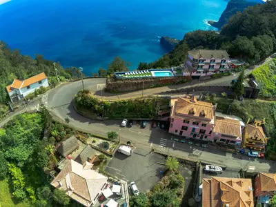 an aerial view of a town with the ocean at Santana in Nature Bed & Breakfast in Santana