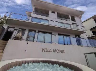 a building with a sign that reads villa mwana at Villa Moniz by LovelyStay in Funchal