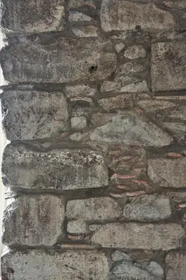 a stone wall of a building with at Hotel Cajú in Funchal
