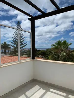 a view from the balcony of a house at Cozy Apartment in Porto Santo