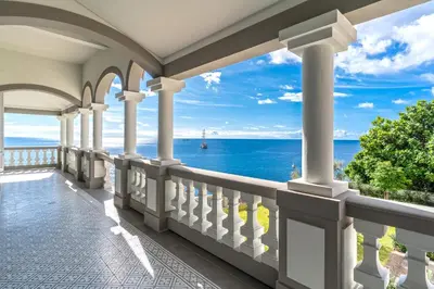 a balcony with a view of the ocean at Luxury Barreirinha House old town by Holiday Rental Madeira in Funchal