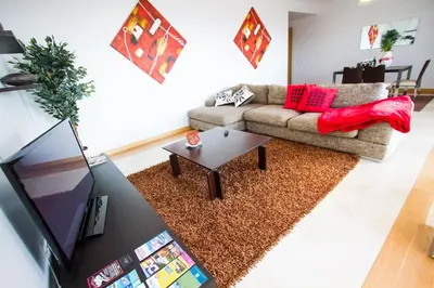 a living room with a couch and a coffee table at Madeira Luxury Villas Living Funchal in Funchal