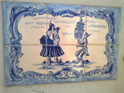 a blue and white tile pattern on a wall at Apartments Vista Oceano in Funchal