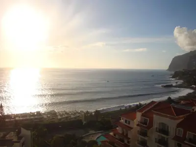 a view of the ocean from a resort at Listen the sound of the Sea - The Sunset of your Dreams in Funchal