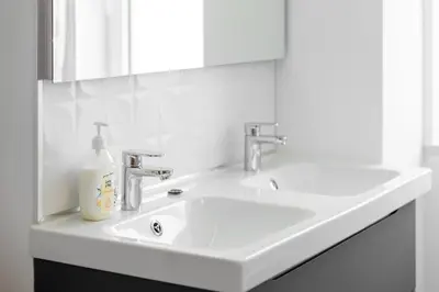 a bathroom with a sink and a toilet at Porto de Mos 95 by Destination Algarve in Lagos