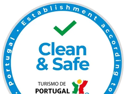 a clean and safe logo with two people in a circle at Luxury apartment with free use of pool, gym and spa in Lagos