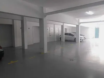 a parking garage with a car parked in it at Madeira - Sunset Sea View of Cabo Girão in Funchal