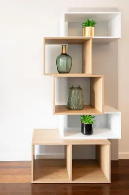 a wooden shelf with two potted plants on it at Centromar Bella Vista by Atlantic Holiday in Funchal