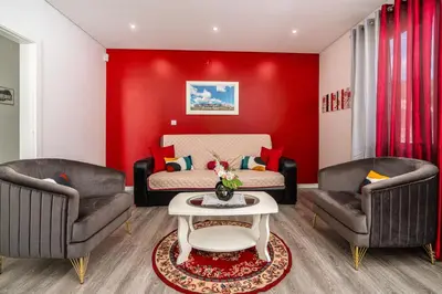 a living room with two chairs and a couch at Roraima House - Private Pool & Garden in Calheta
