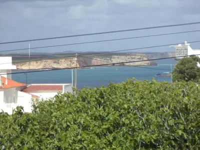 a view of a bridge over a body of water at Quartos Maria Clara in Sagres