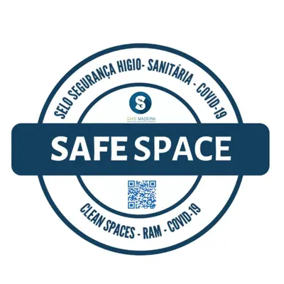 a label for safe space with a blue ribbon at FX Carvalhal in Funchal