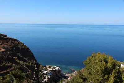 a view of the ocean from a cliff at Apartamento MAR AZUL in Calheta