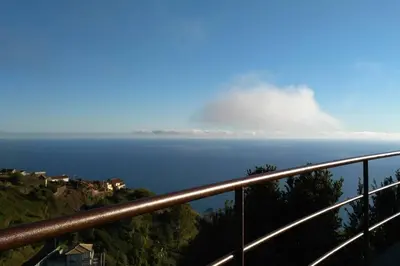 a view of the ocean from a balcony at Raposeira de São João, the feeling of peace, space and quiet, Whole villa is yours in Fajã da Ovelha