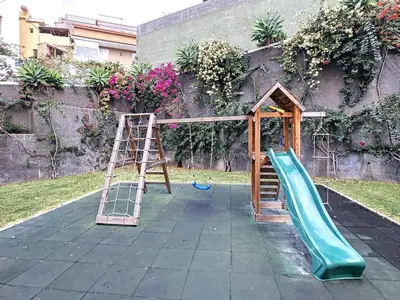 a playground with a slide and a ladder at Apartment Lotus by LovelyStay in Funchal