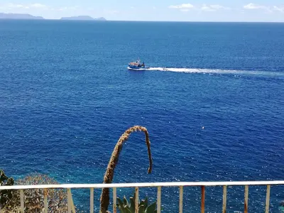 a boat in the middle of the ocean at See to Sea in Santa Cruz