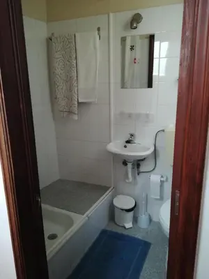 a bathroom with a tub sink and a toilet at Cc39-Q6 in Funchal