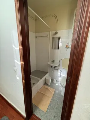 a bathroom with a tub and a toilet and a sink at Cc39-Q6 in Funchal