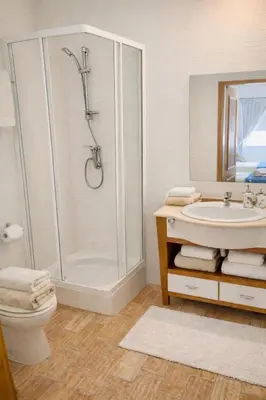 a bathroom with a shower and a toilet and a sink at Casadaluz 86 - Porto dona Maria casa do mar , 2 bedrooms , Amazing sea view , salt water pool , wifi in Luz
