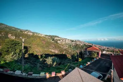 an aerial view of a mountain with the ocean at Casa da Terça - Nice View and Parking in Funchal