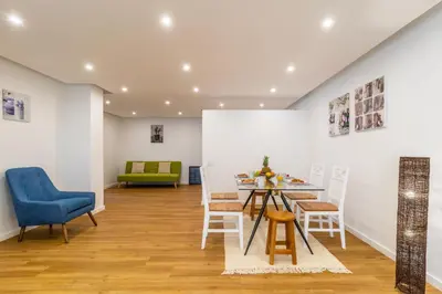 a dining room with a table and chairs at Magnolia Apartment by Atlantic Holiday in Funchal