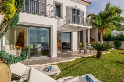 a villa with a view of the yard at OurMadeira - Amaro Sol in Calheta