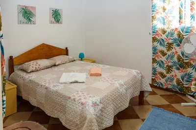 a bedroom with a bed in a room at Residencia ANA Piso Zero 0 in Santa Cruz