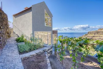 a house with a view of the ocean at Socalco Nature Calheta in Calheta