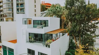 an image of a white building with balconies at FLH Casa Branca Madeira in Funchal