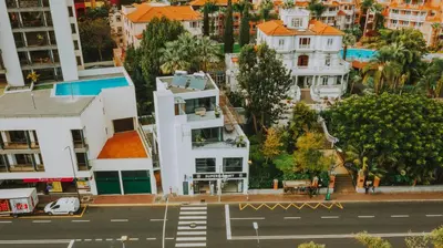 an aerial view of a city street with buildings at FLH Casa Branca Madeira in Funchal