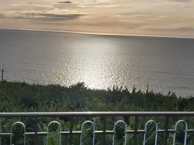 a view of the ocean from a balcony at Tabua Village Madeira Suite 5 Nature Lovers in Ribeira Brava