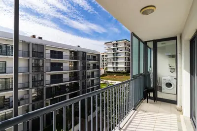 a balcony with a view of a building at Acacia Apartment by Atlântica in Funchal