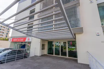 awning over the entrance to a building at FLH Funchal Balcony Apartment with Sea View in Funchal