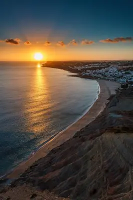 an aerial view of a beach at sunset at Mariners (5) - Bright and stylish apartment - walk to the beach in Luz