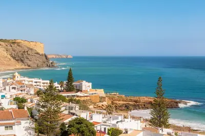 a view of a village and the ocean at Mariners (2) - Bright and stylish apartment - walk to the beach in Luz