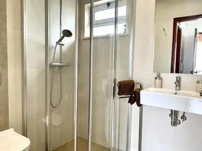 a bathroom with a shower and a sink at Monte Lemos 29 in Luz