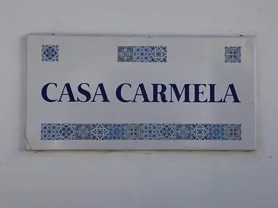 a sign that says casa campania on a wall at Casa Carmela in Burgau