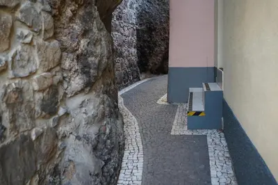 a bridge on the side of a mountain at Villa Sunset Avenue in Paul do Mar