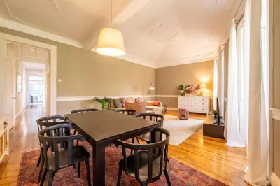 a dining room with a table and chairs at The Wine Lodges by An Island Apart in Funchal