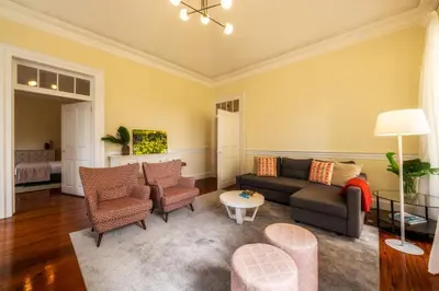 a living room with a couch and chairs at The Wine Lodges by An Island Apart in Funchal