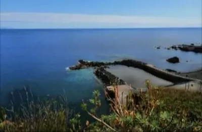 an island in the middle of a body of water at Apartamento Marques in Santa Cruz