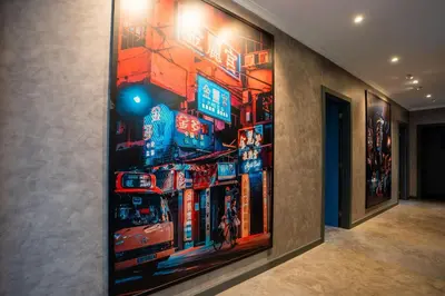 a room with a painting on the wall at Mansão Macau by LovelyStay in Arco da Calheta