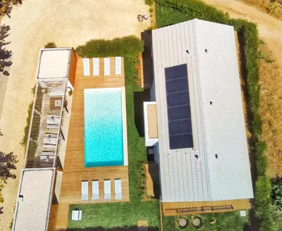 an aerial view of a building with a swimming pool at Casa Vica - Sagres Apartments in Sagres