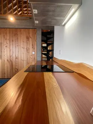 a dance floor in a room with wooden walls at Casa Pereirinha in Estreito da Calheta