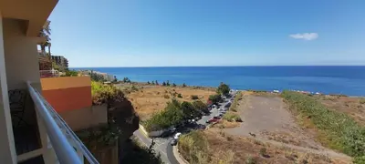 a view of the ocean from a balcony of a building at Dorisol Vista Formosa by rentallido in Funchal