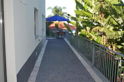 a walkway to the balcony of a house at Descobrir Madeira in Gaula
