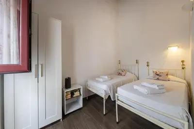 a room with two beds in a room at C14 - Casa da Luz in Luz