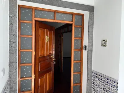 an open wooden door in a room at Classic Tranquil Madeiran 4-Bedroom Villa Funchal in Funchal