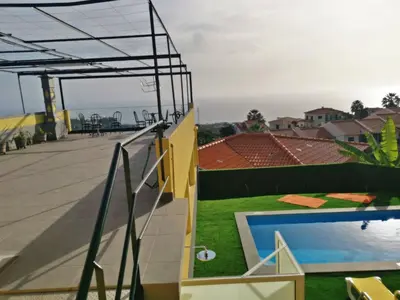 a view of a swimming pool on a roof at CASA DOS AVÓS Apartments with Pool in Funchal in Funchal