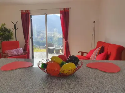 a bowl of fruit on a table in a living room at Zef's chalet in Senhora do Rosário