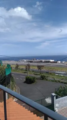 a view of the beach from the balcony of a building at Villas Madalena Chalets vista mar cWiFi in Santa Cruz